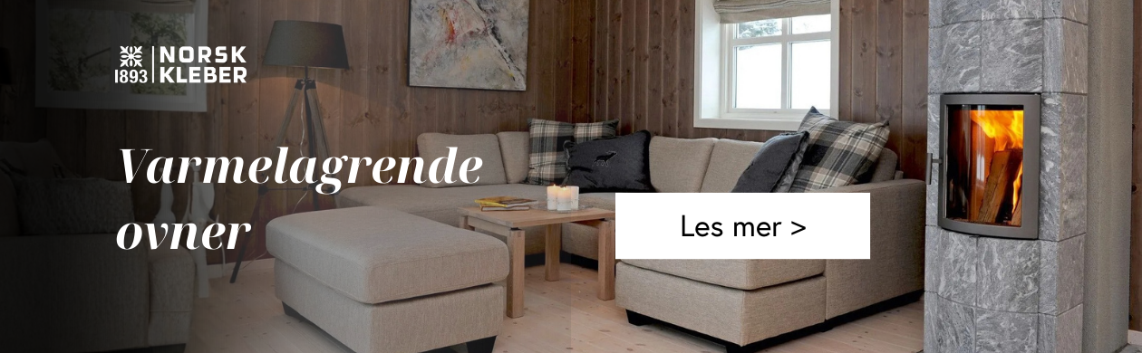 Bilde av en klebersteinsovn i et hyttemiljø