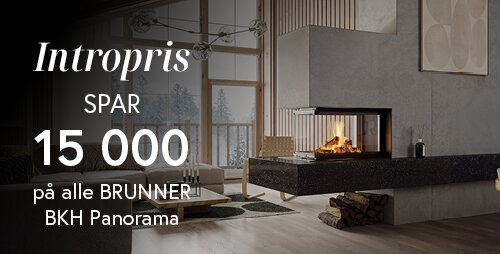 Peisinnsats som er ommrammet av grå stein helt til taket